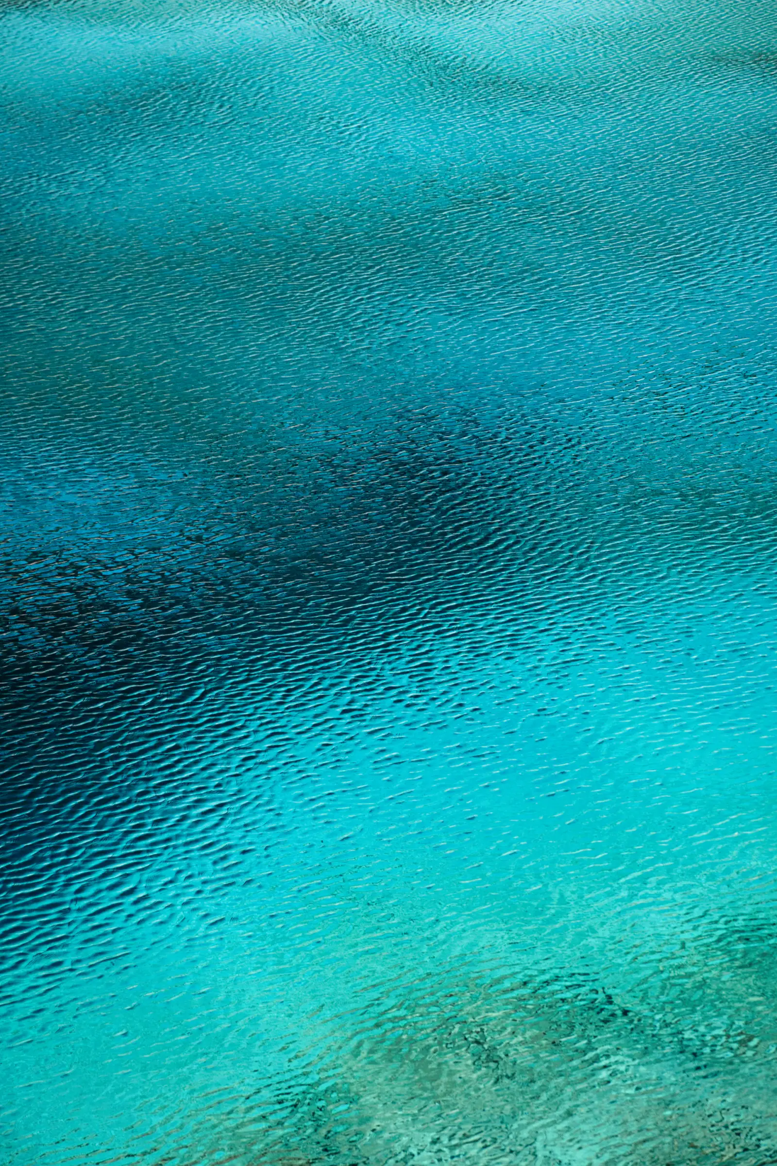 Sunlight and movement on turquoise water